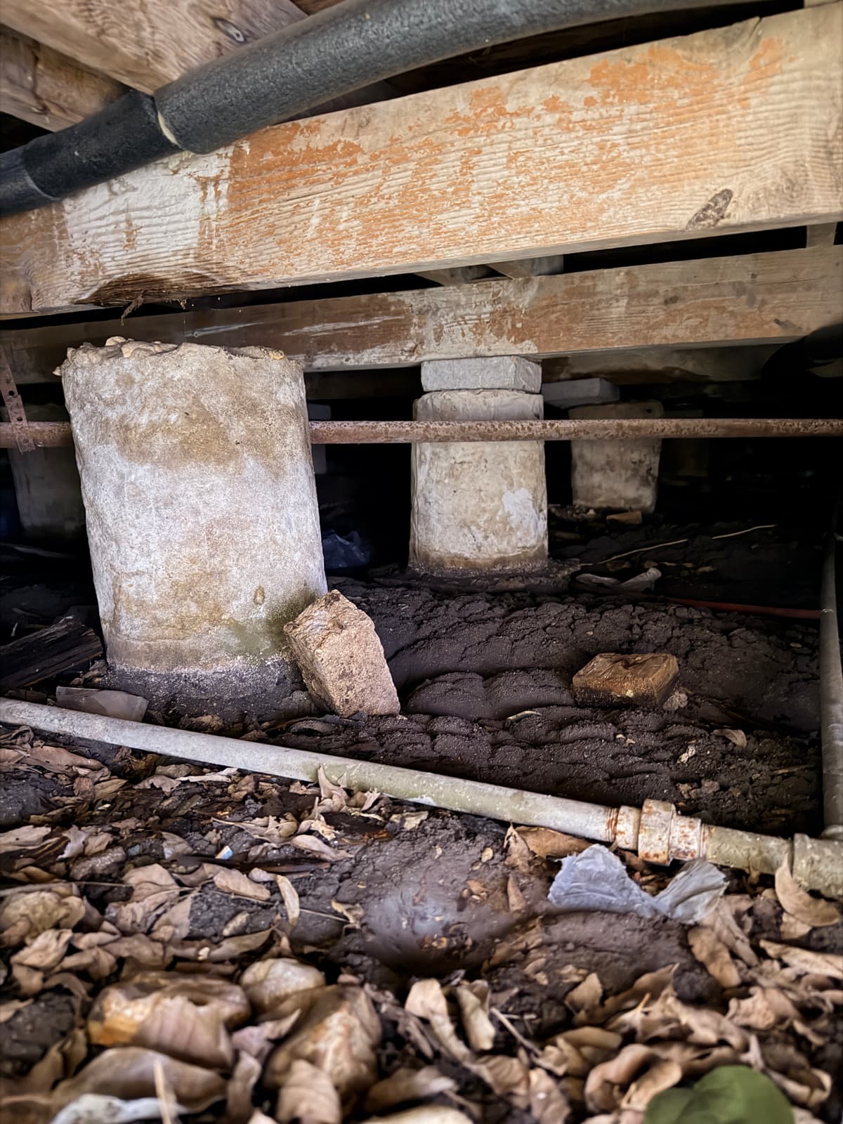 Deteriorated pier & beam supports under a San Antonio home