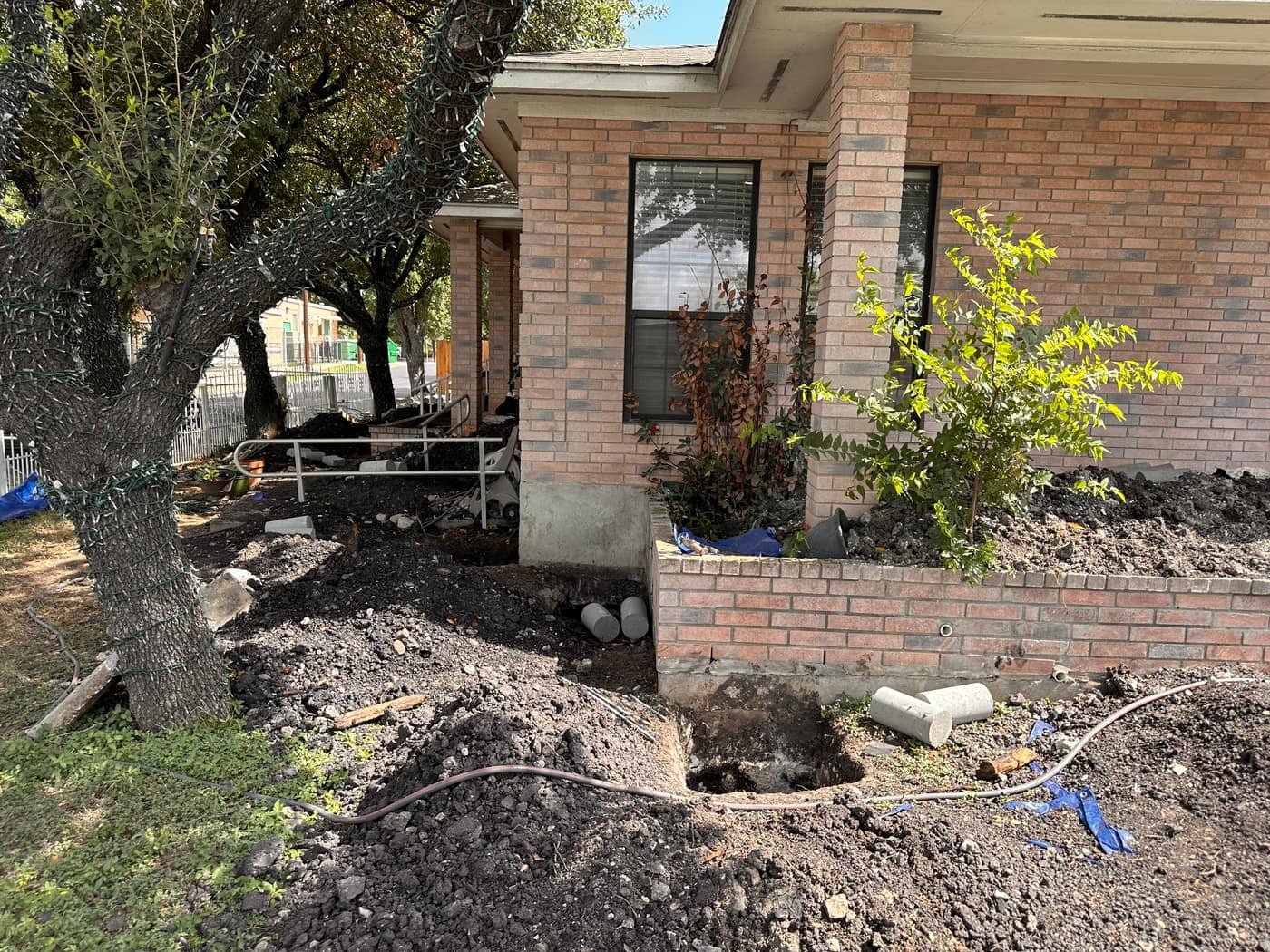 Finished foundation repair project on a San Antonio brick home