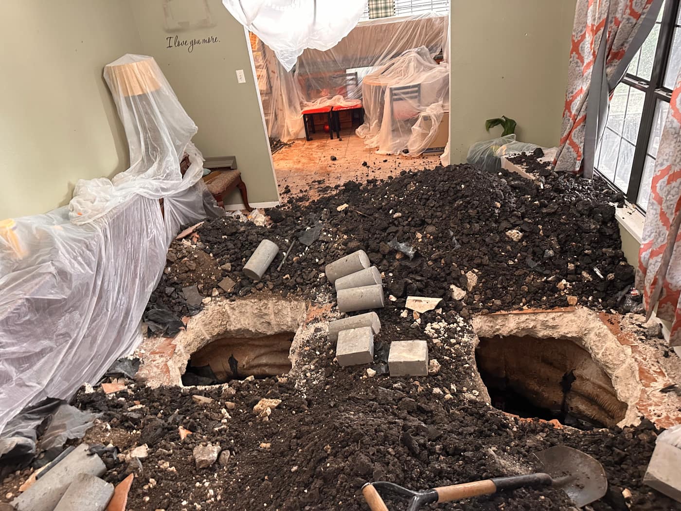 Interior slab foundation repair with protective covering