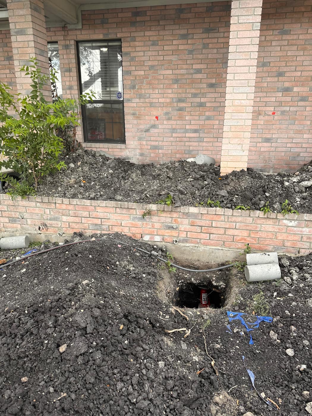 Drainage pipe installed along a repaired foundation