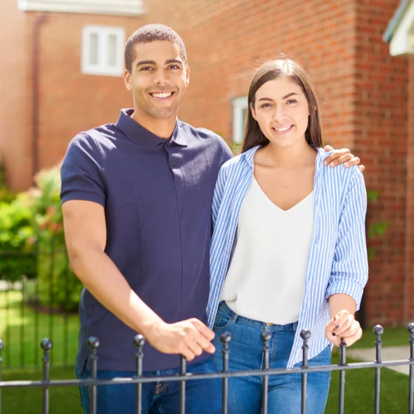 An image showing happy homeowners after foundation repair is completed in San Antonio and Austin.